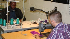 03_Students learn industrial cutting and sewing in a training program organized by a coalition of businesses and industry partners
